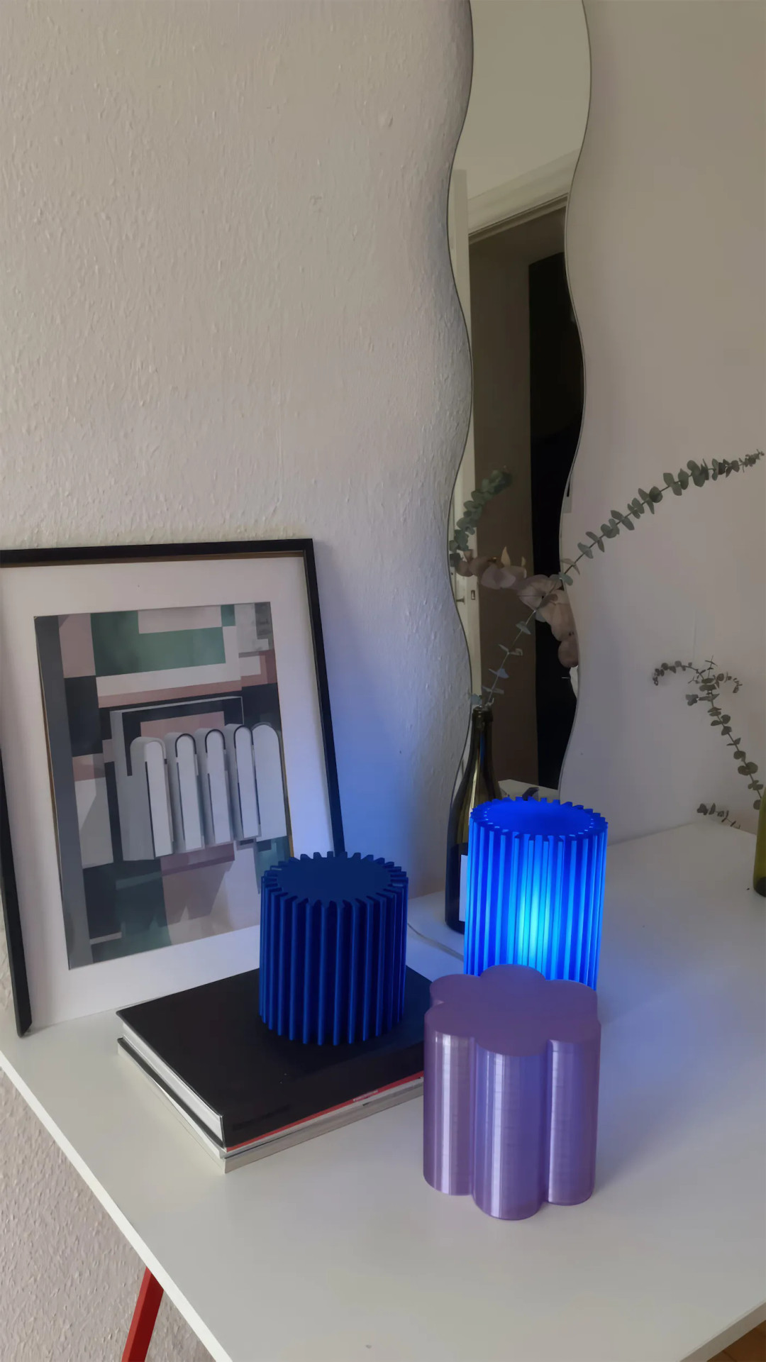 Boole sculptural table lamps, 3D-printed from eco-friendly PLA plastic. Their ribbed, petal-like forms diffuse light softly, creating an ambient glow. Inspired by modernist architecture and organic shapes, these statement lamps blend art and functionality. Available in various colors and sizes. Worldwide shipping from Germany. For inquiries and orders, contact us on WhatsApp.