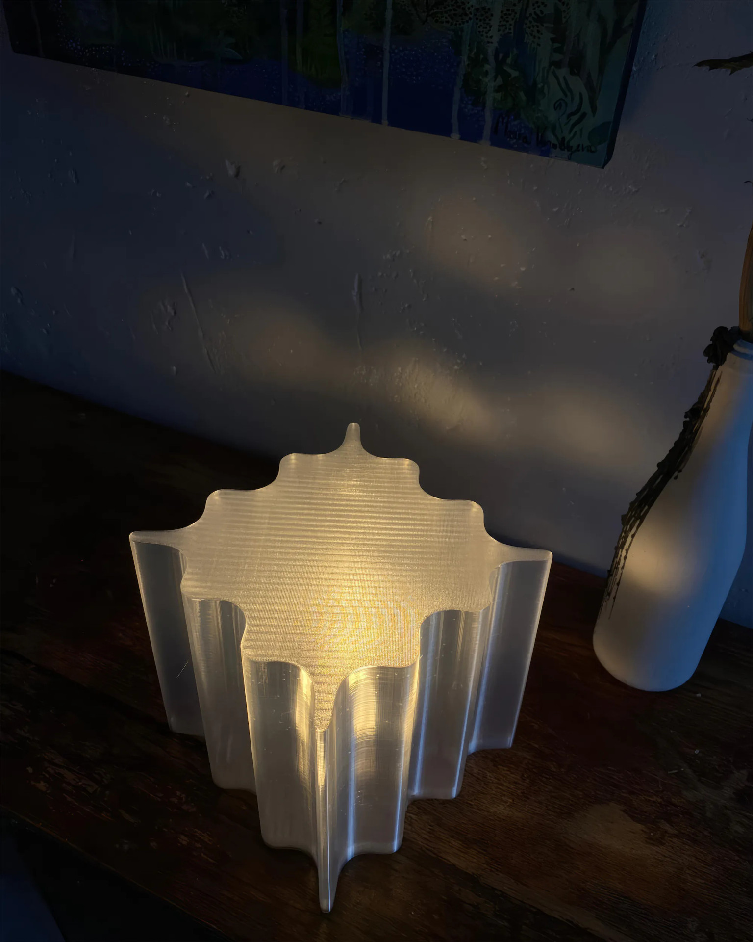 Boole sculptural table lamps, 3D-printed from eco-friendly PLA plastic. Their ribbed, petal-like forms diffuse light softly, creating an ambient glow. Inspired by modernist architecture and organic shapes, these statement lamps blend art and functionality. Available in various colors and sizes. Worldwide shipping from Germany. For inquiries and orders, contact us on WhatsApp.